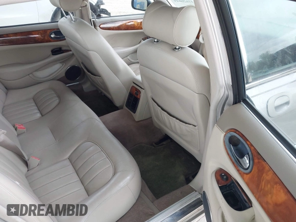 1999 Jaguar XJ with VIN SAJHX1043XC856474, listed as a IAAI auction lot 41626649 with 103,266 mi miles and . Bid and sale history available at DreamBid. Image 8.