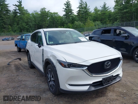 2018 Mazda CX-5 Grand Touring with VIN JM3KFBDM0J0308813, listed as a IAAI auction lot 42657978 with 78,119 mi miles and . Bid and sale history available at DreamBid. Image 1.