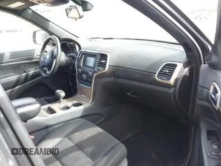 2015 Jeep Grand Cherokee Laredo with VIN 1C4RJFAG6FC140581, listed as a IAAI auction lot 41869952 with 193,295 mi miles. Bid and sale history available at carsss.com. Image 5.