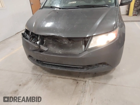 2015 Honda Odyssey EX-L with VIN 5FNRL5H64FB055890, listed as a IAAI auction lot 41706141 with 155,167 mi miles and . Bid and sale history available at carsss.com. Image 12.
