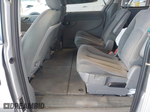 2005 Dodge Caravan SE with VIN 1D4GP24R85B351591, listed as a IAAI auction lot 41949337 with 130,821 mi miles and . Bid and sale history available at DreamBid. Image 8.