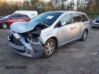 2017 Honda Odyssey SE with VIN 5FNRL5H38HB020908, listed as a IAAI auction lot 41239727 with 112,316 mi miles and . Bid and sale history available at carsss.com. Image 2.