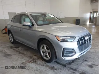 2021 Audi Q5 Premium z VIN WA1AAAFY6M2108521, wystawiony jako IAAI lot #41923068 z przebiegiem 121 889 mil mil oraz . Historia ofert i sprzedaży dostępna na DreamBid. Obrazek 1.