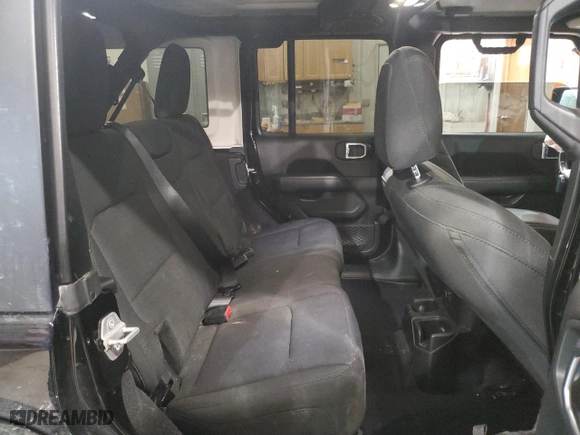 2020 Jeep Wrangler Unlimited North Edition with VIN 1C4HJXEN7LW127892, listed as a Copart auction lot 88879245 with 93,651 mi miles and Salvage Title. Bid and sale history available at carsss.com. Image 11.