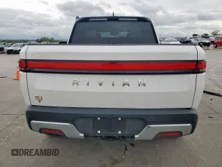 2022 Rivian R1T Adventure z VIN 7FCTGAAA8NN013508, wystawiony jako Copart lot #50834485 z przebiegiem Nie podano mil oraz Szkody całkowita. Historia ofert i sprzedaży dostępna na DreamBid. Obrazek 6.