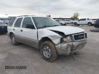 2000 GMC Jimmy SLE z VIN 1GKCS13W6Y2291895, wystawiony jako IAAI lot #41180518 z przebiegiem 152 767 mil mil oraz . Historia ofert i sprzedaży dostępna na DreamBid. Obrazek 1.