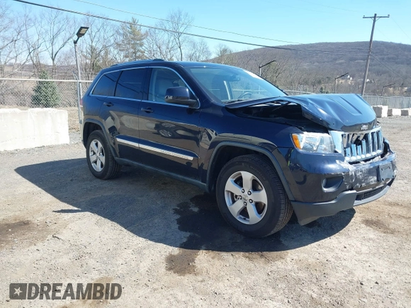 2011 Jeep Grand Cherokee Laredo with VIN 1J4RR4GG3BC670712, listed as a IAAI auction lot 41738127 with 93,714 mi miles and . Bid and sale history available at DreamBid. Image 1.