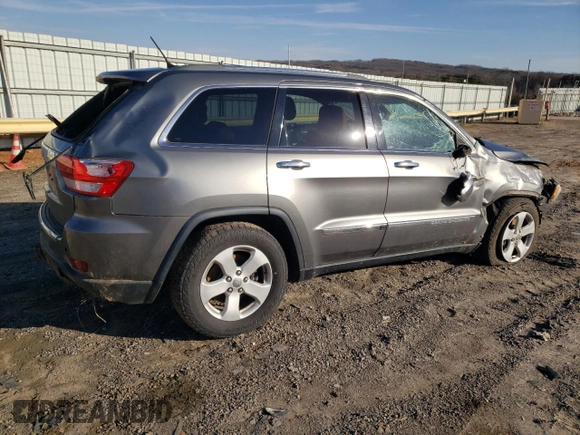 2013 Jeep Grand Cherokee Overland with VIN 1C4RJFCG0DC607214, listed as a Copart auction lot 43672575 with 188,026 mi miles and Salvage Title. Bid and sale history available at carsss.com. Image 3.
