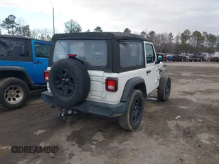 2021 Jeep Wrangler Sport S with VIN 1C4GJXAN6MW677281, listed as a IAAI auction lot 40814351 with 55,360 mi miles and . Bid and sale history available at DreamBid. Image 4.