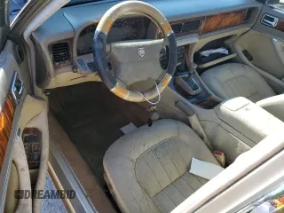 1997 Jaguar XJ with VIN SAJHX6241VC795259, listed as a Copart auction lot 70752854 with Not provided miles and Salvage title. Bid and sale history available at DreamBid. Image 8.