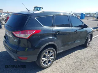 2014 Ford Escape Titanium with VIN 1FMCU0JX6EUB49652, listed as a IAAI auction lot 42136494 with 195,108 mi miles. Bid and sale history available at carsss.com. Image 4.