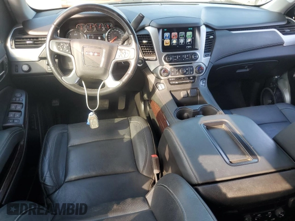 2019 GMC Yukon SLT with VIN 1GKS1BKC0KR387936, listed as a Copart auction lot 77191904 with 60,514 mi miles and Salvage Title. Bid and sale history available at carsss.com. Image 8.