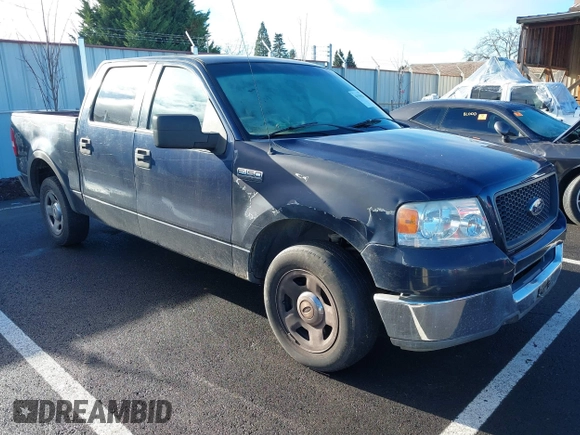 2005 Ford F-150 XLT with VIN 1FTRW12W25KB58736, listed as a IAAI auction lot 41119113 with 218,797 mi miles. Bid and sale history available at carsss.com. Image 1.