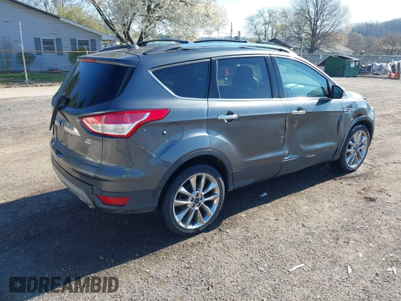2015 Ford Escape SE with VIN 1FMCU9G97FUA89251, listed as a IAAI auction lot 41919240 with 148,472 mi miles and . Bid and sale history available at DreamBid. Image 4.