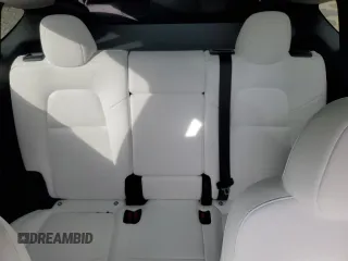 2024 Tesla Model Y Long Range с VIN 7SAYGDEE5RF983771, выставлен на аукционе Copart как лот 86153274 с пробегом 4 105 миль миль и Списание • Salvage title. История ставок и продаж доступна на DreamBid. Изображение 10.