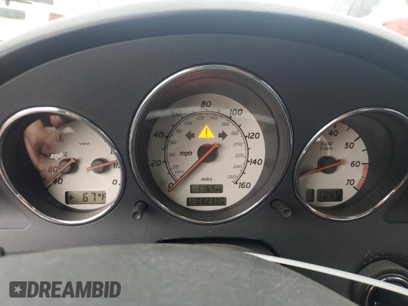 2003 Mercedes-Benz SLK 320 with VIN WDBKK65F33F286090, listed as a Copart auction lot 54711385 with 82,300 mi miles and Salvage title. Bid and sale history available at DreamBid. Image 9.