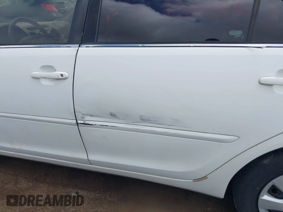 2004 Toyota Camry LE with VIN 4T1BE32K84U340887, listed as a IAAI auction lot 42143000 with Not Provided miles and . Bid and sale history available at DreamBid. Image 13.