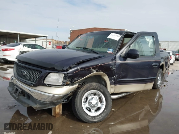 2000 Ford F-150 XL with VIN 1FTRX17L2YNB85627, listed as a IAAI auction lot 41377814 with 123,740 mi miles. Bid and sale history available at carsss.com. Image 2.