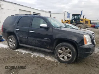 2009 GMC Yukon SLT w/4SB with VIN 1GKFK33099R228562, listed as a Copart auction lot 42191375 with 133,568 mi miles and Salvage Title. Bid and sale history available at carsss.com. Image 4.