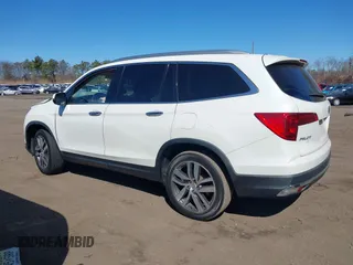 2017 Honda Pilot Touring z VIN 5FNYF6H99HB089121, wystawiony jako IAAI lot #41896878 z przebiegiem 145 330 mil mil oraz . Historia ofert i sprzedaży dostępna na DreamBid. Obrazek 14.