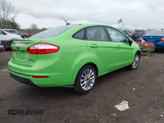 2014 Ford Fiesta SE with VIN 3FADP4BJ1EM110575, listed as a IAAI auction lot 41846117 with 79,027 mi miles. Bid and sale history available at carsss.com. Image 4.
