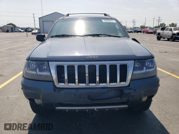 2004 Jeep Grand Cherokee Limited z VIN 1J4GW58S34C330987, wystawiony jako Copart lot #59089675 z przebiegiem 249 335 mil mil oraz Szkoda całkowita • Salvage title. Historia ofert i sprzedaży dostępna na DreamBid. Obrazek 5.