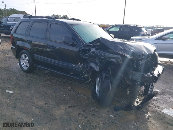 2005 Jeep Grand Cherokee Laredo with VIN 1J4GS48K85C709829, listed as a IAAI auction lot 41200259 with 1 mi miles. Bid and sale history available at carsss.com. Image 1.