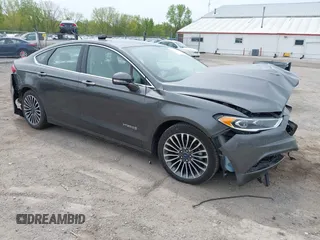 2018 Ford Fusion Titanium with VIN 3FA6P0RU1JR120392, listed as a IAAI auction lot 42145342 with Not provided miles and . Bid and sale history available at DreamBid. Image 1.