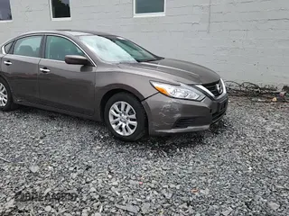 2016 Nissan Altima S with VIN 1N4AL3AP8GN313633, listed as a Copart auction lot 63068905 with 69,850 mi miles and Salvage title. Bid and sale history available at DreamBid. Image 13.