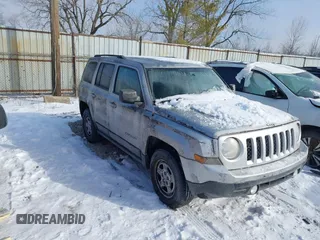 2011 Jeep Patriot Latitude with VIN 1J4NT1GBXBD289758, listed as a IAAI auction lot 41301702 with 215,068 mi miles. Bid and sale history available at carsss.com. Image 1.