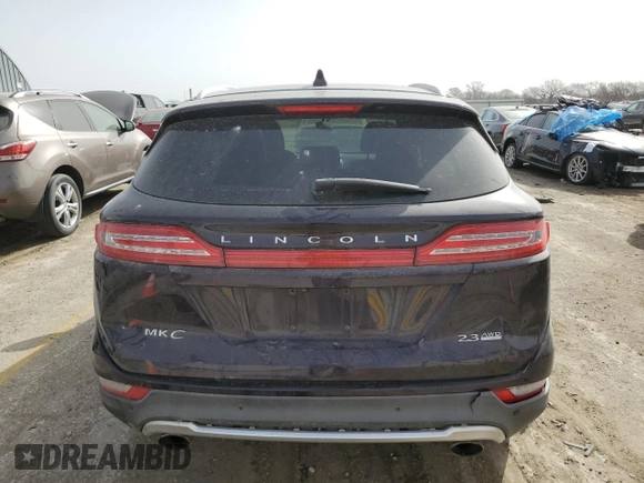 2015 Lincoln MKC with VIN 5LMTJ2AH8FUJ10346, listed as a Copart auction lot 49037035 with 108,411 mi miles and Salvage Title. Bid and sale history available at DreamBid. Image 6.