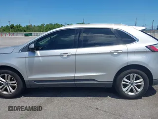 2019 Ford Edge SEL with VIN 2FMPK3J94KBB67207, listed as a IAAI auction lot 42758134 with 154,823 mi miles and . Bid and sale history available at DreamBid. Image 14.