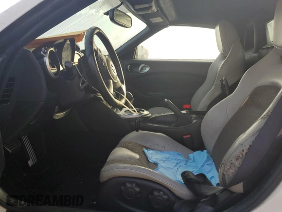 2014 Nissan 370Z Touring with VIN JN1AZ4FH8EM621259, listed as a Copart auction lot 77571454 with Not Provided miles and Salvage Title. Bid and sale history available at DreamBid. Image 7.
