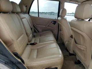 2001 Mercedes-Benz M 320/430/500 with VIN 4JGAB54E41A272057, listed as a Copart auction lot 58197965 with 150,829 mi miles and Salvage title. Bid and sale history available at DreamBid. Image 11.