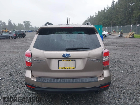 2015 Subaru Forester Touring with VIN JF2SJAUC1FH457069, listed as a IAAI auction lot 42293542 with 71,689 mi miles and . Bid and sale history available at DreamBid. Image 16.