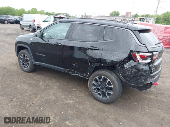 2019 Jeep Compass Trailhawk with VIN 3C4NJDDB7KT727762, listed as a IAAI auction lot 42299260 with 56,733 mi miles and . Bid and sale history available at DreamBid. Image 3.
