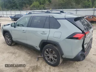 2023 Toyota RAV4 Hybrid XLE Premium with VIN JTMB6RFV8PD097109, listed as a Copart auction lot 59970995 with 43,197 mi miles and Salvage title. Bid and sale history available at DreamBid. Image 2.