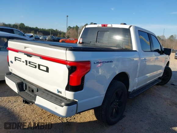 2022 Ford F-150 Lightning Pro with VIN 1FTVW1EV4NWG04301, listed as a IAAI auction lot 41821787 with 38,417 mi miles and . Bid and sale history available at DreamBid. Image 4.