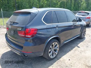 2016 BMW X5 xDrive35i z VIN 5UXKR0C51G0P22771, wystawiony jako IAAI lot #42161841 z przebiegiem 117 272 mil mil oraz . Historia ofert i sprzedaży dostępna na DreamBid. Obrazek 4.
