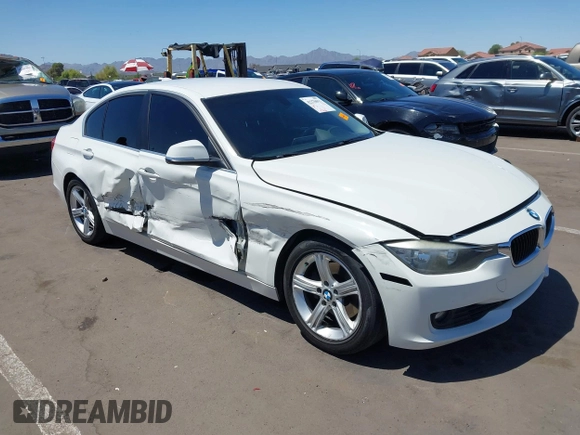 2015 BMW 3 Series 328i with VIN WBA3C1C52FK117753, listed as a IAAI auction lot 42270013 with 147,386 mi miles and . Bid and sale history available at DreamBid. Image 1.