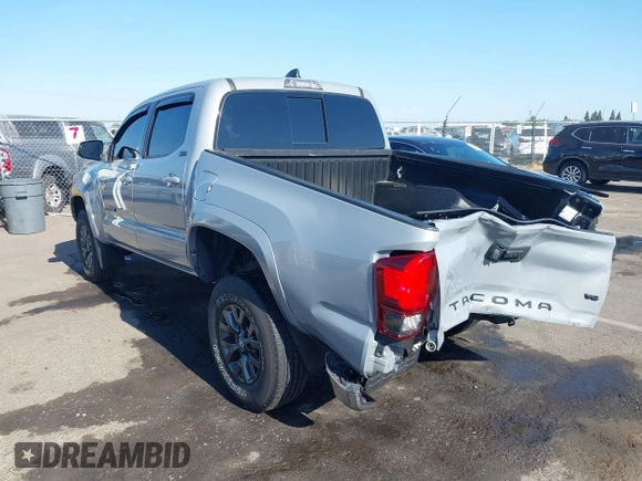 2021 Toyota Tacoma SR5 with VIN 5TFAZ5CN7MX101810, listed as a IAAI auction lot 42454418 with 58,930 mi miles and . Bid and sale history available at DreamBid. Image 3.