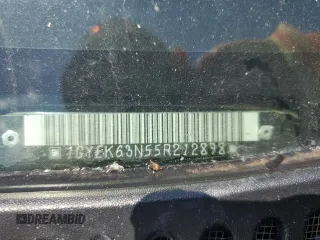 2005 Cadillac Escalade z VIN 1GYEK63N55R212898, wystawiony jako Copart lot #54323405 z przebiegiem Nie podano mil oraz Szkoda całkowita • Salvage title. Historia ofert i sprzedaży dostępna na DreamBid. Obrazek 13.