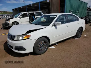 2010 Kia Optima LX z VIN KNAGG4A8XA5382979, wystawiony jako Copart lot #57067065 z przebiegiem 104 611 mil mil oraz Szkoda całkowita • Salvage title. Historia ofert i sprzedaży dostępna na DreamBid. Obrazek 1.