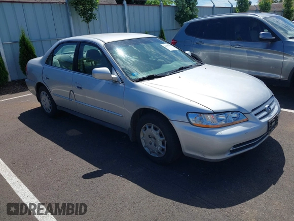 2002 Honda Accord LX with VIN 1HGCG56422A167829, listed as a IAAI auction lot 42401497 with 221,550 mi miles and . Bid and sale history available at DreamBid. Image 1.