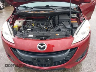 2012 Mazda 5 Grand Touring with VIN JM1CW2DL8C0142628, listed as a IAAI auction lot 42350676 with 84,764 mi miles and . Bid and sale history available at DreamBid. Image 10.