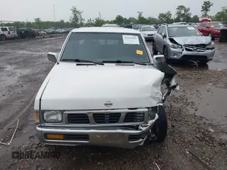 1995 Nissan Frontier XE with VIN 1N6SD16S5SC350962, listed as a IAAI auction lot 42216026 with 156,163 mi miles and . Bid and sale history available at DreamBid. Image 12.
