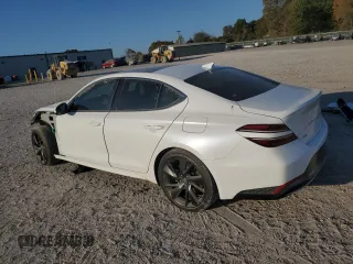 2023 Genesis G70 2.0T with VIN KMTG34TA3PU105184, listed as a Copart auction lot 77366344 with 36,582 mi miles and Salvage Title. Bid and sale history available at carsss.com. Image 2.