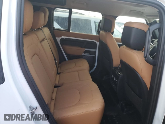 2024 Land Rover Defender S with VIN SALEJ7EX0R2341653, listed as a Copart auction lot 77228254 with Not provided miles and Salvage title. Bid and sale history available at DreamBid. Image 11.