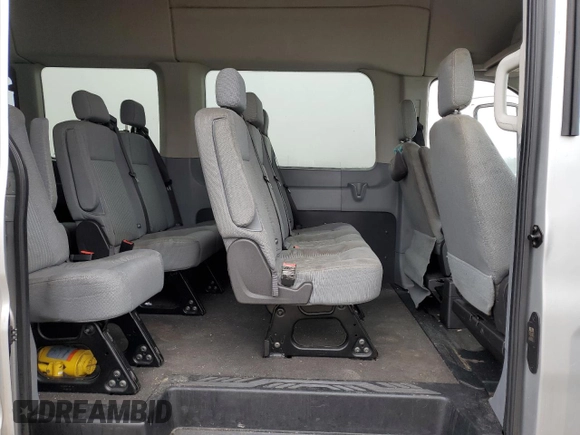 2015 Ford Transit XL z VIN 1FBVU4XG3FKA36240, wystawiony jako Copart lot #49159275 z przebiegiem 123 852 mil mil oraz Szkody całkowita. Historia ofert i sprzedaży dostępna na DreamBid. Obrazek 11.