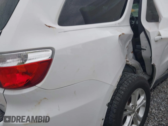 2013 Dodge Durango Crew with VIN 1C4RDJDGXDC693933, listed as a IAAI auction lot 42201796 with 169,051 mi miles and . Bid and sale history available at DreamBid. Image 6.